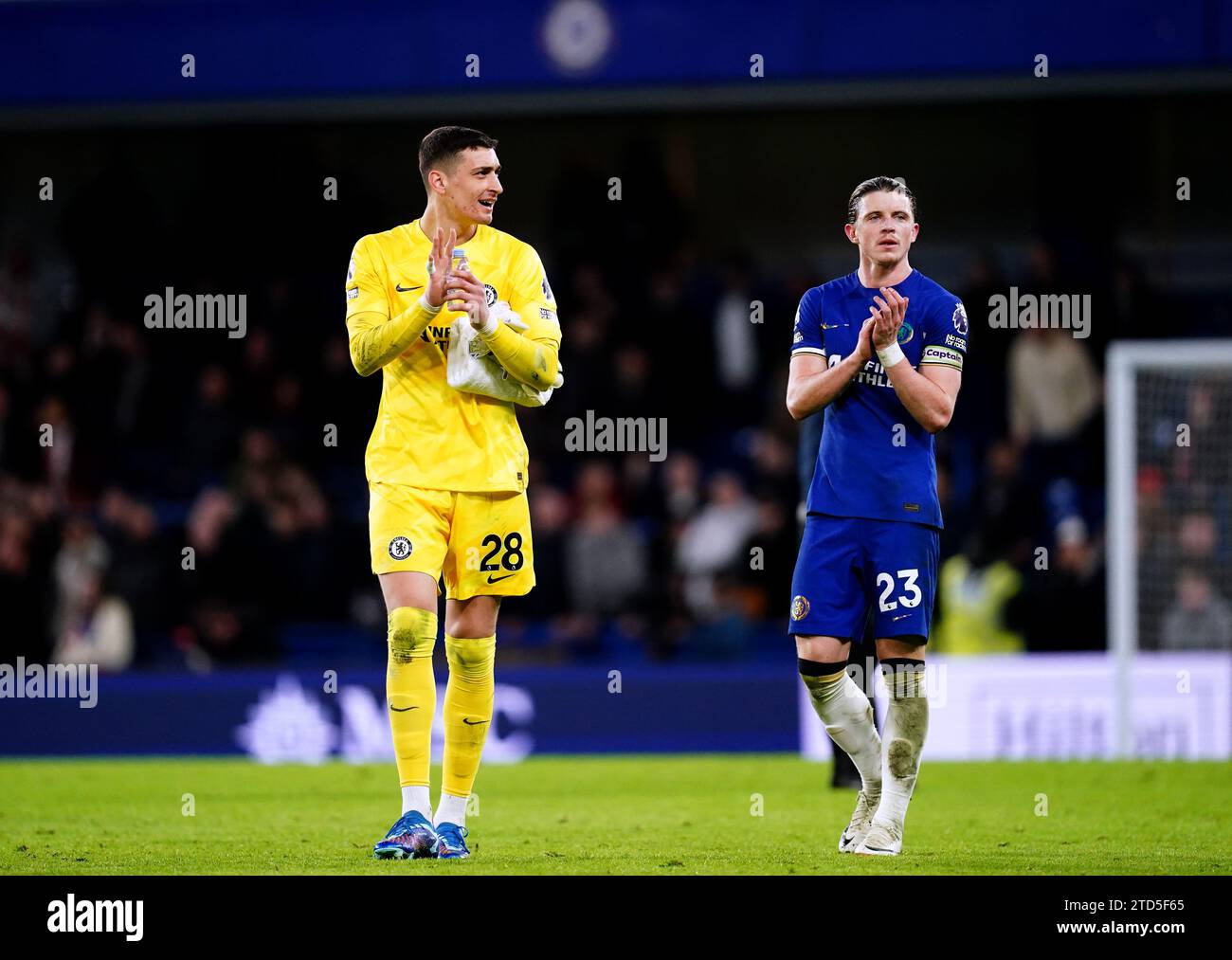 Chelsea goalkeeper Djordje Petrovic (left) and Conor Gallagher applaud the fans at the end of the Premier League match at Stamford Bridge, London. Picture date: Saturday December 16, 2023. Stock Photo