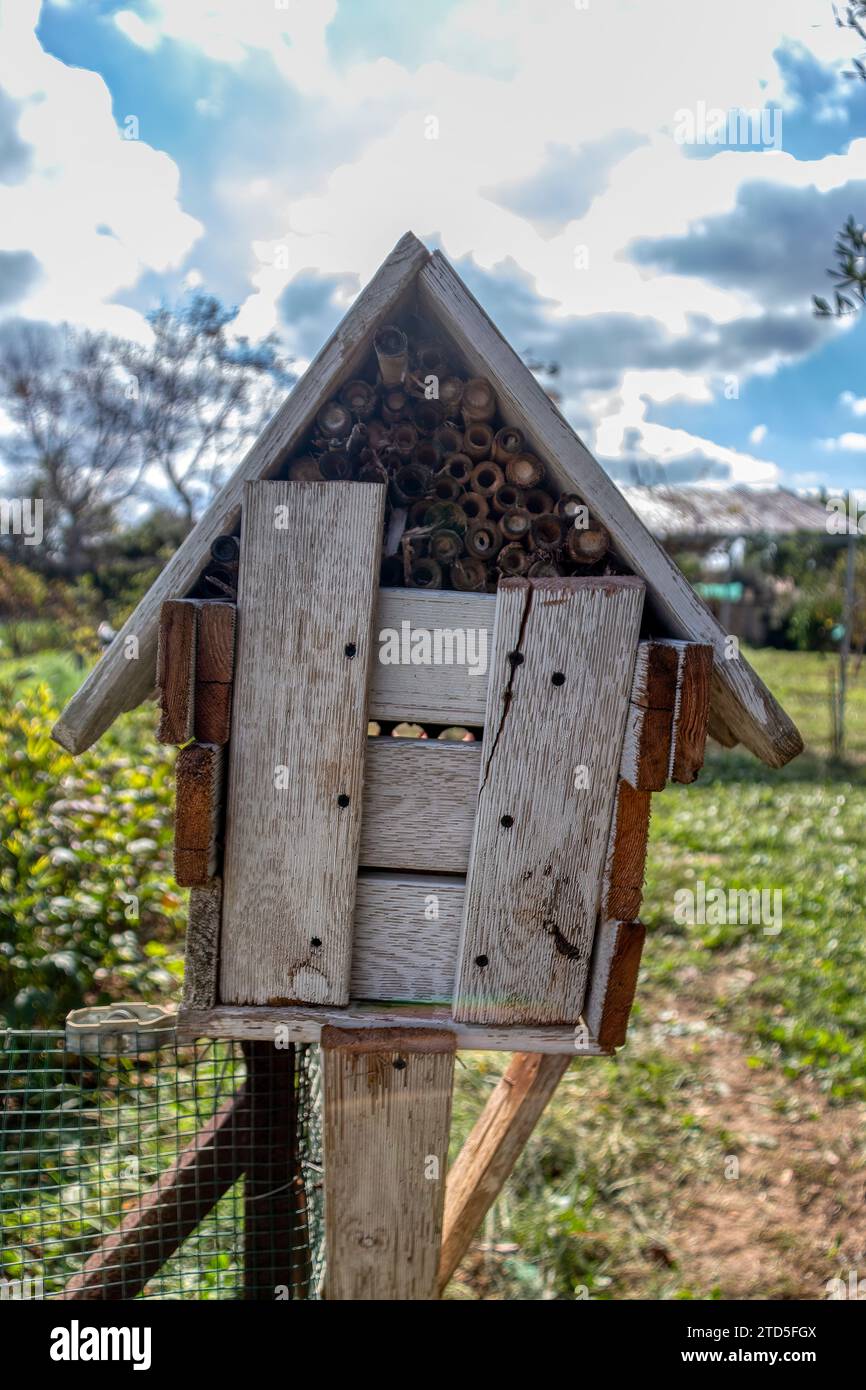Insect house in an organically grown orchard Stock Photo