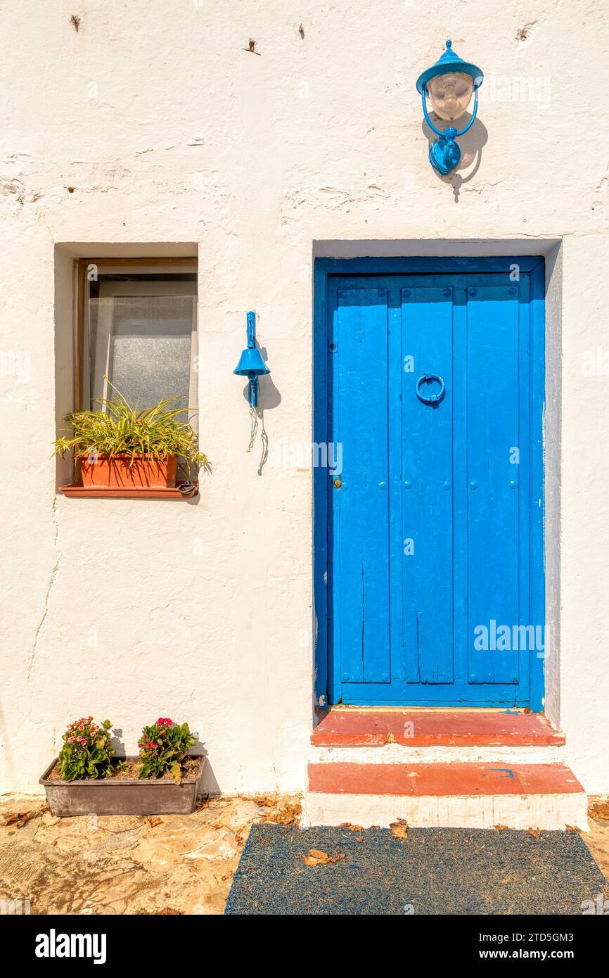 Facade of a traditional house. Old blue wooden door Stock Photo - Alamy
