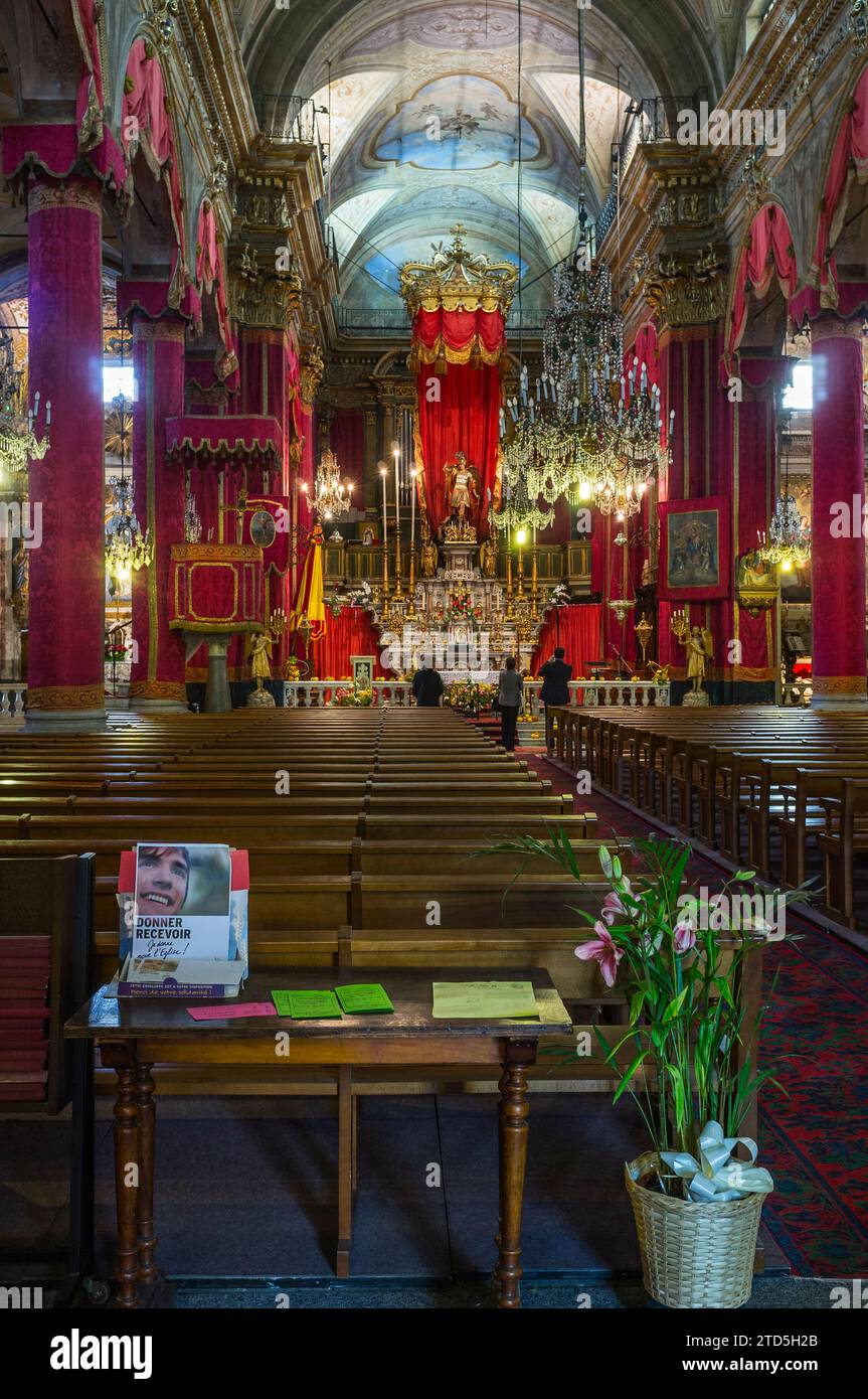 Menton, France - February 18, 2012: Interior of the St. Michael's basilica. Situated along the Franco-Italian border, Menton is well-known as 'The Pea Stock Photo