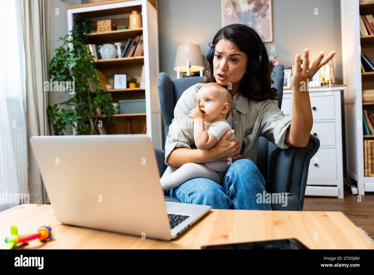 Business woman on maternity leave. Mother with newborn baby working