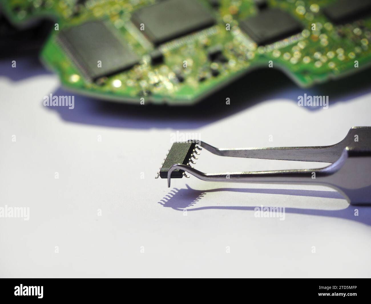 Semiconductor component supply. Microchip spare parts in the electronics industry. (Smt IC) Integrated circuit assembly. Stock Photo