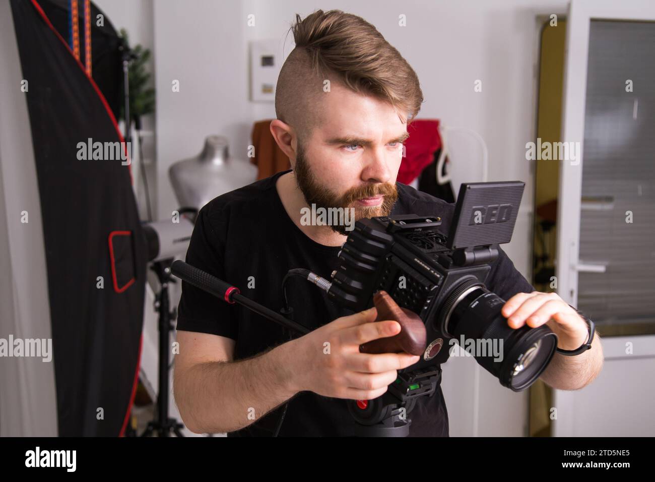 UFA, RUSSIA - 29 FEBRUARY 2020: cameraman works with Red digital cinema cameras. RED is the leading manufacturer of professional digital cinema Stock Photo