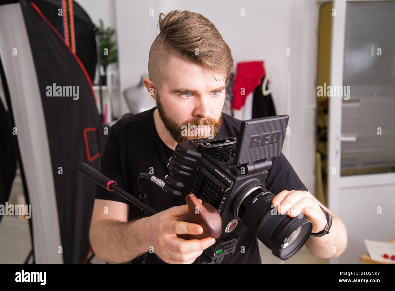 UFA, RUSSIA - 29 FEBRUARY 2020: cameraman works with Red digital cinema cameras. RED is the leading manufacturer of professional digital cinema Stock Photo