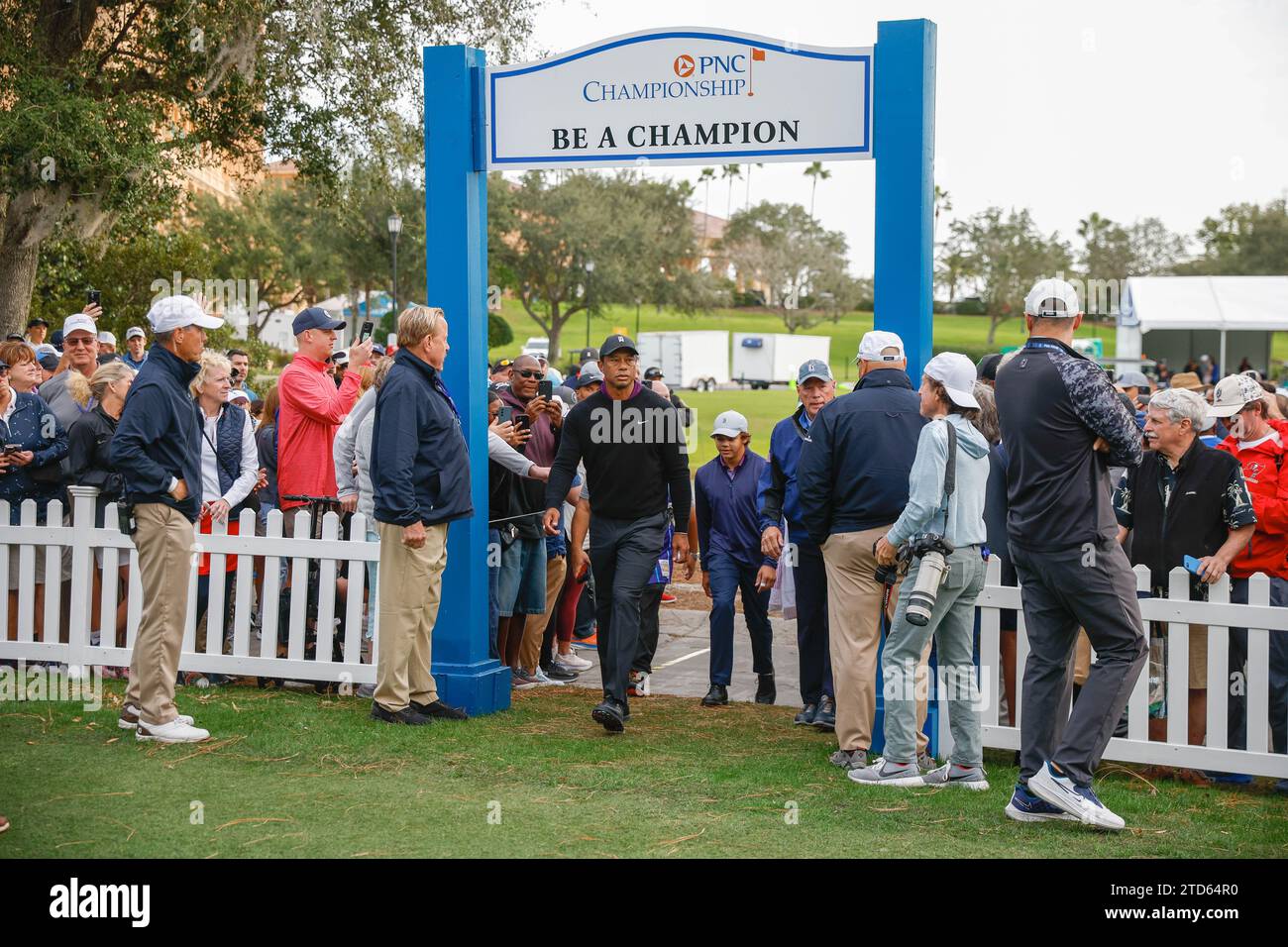 December 15, 2023 Tiger Woods and son Charlie Woods entering the first