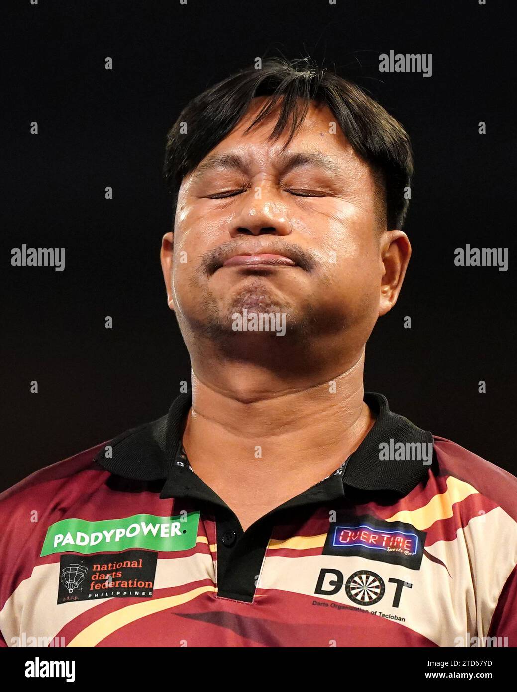 Reynaldo Rivera reacts after his match against Keane Barry (not pictured) on day two of the Paddy Power World Darts Championship at Alexandra Palace, London. Picture date: Saturday December 16, 2023. Stock Photo