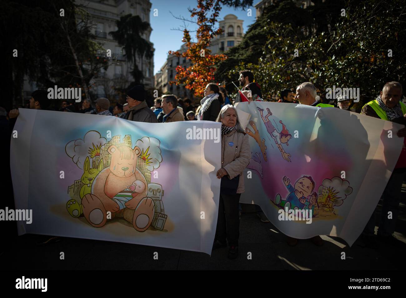 A group of protesters hold banners during the pro-Palestinian rally in front of the congress Palace. Dozens of children accompanied by their parents gathered in front of the Congress Palace of Deputies dressed in stuffed animals and toys as a symbol of the thousands of Palestinian children killed during the Israel - Palestine war. (Photo by David Canales / SOPA Images/Sipa USA) Stock Photo