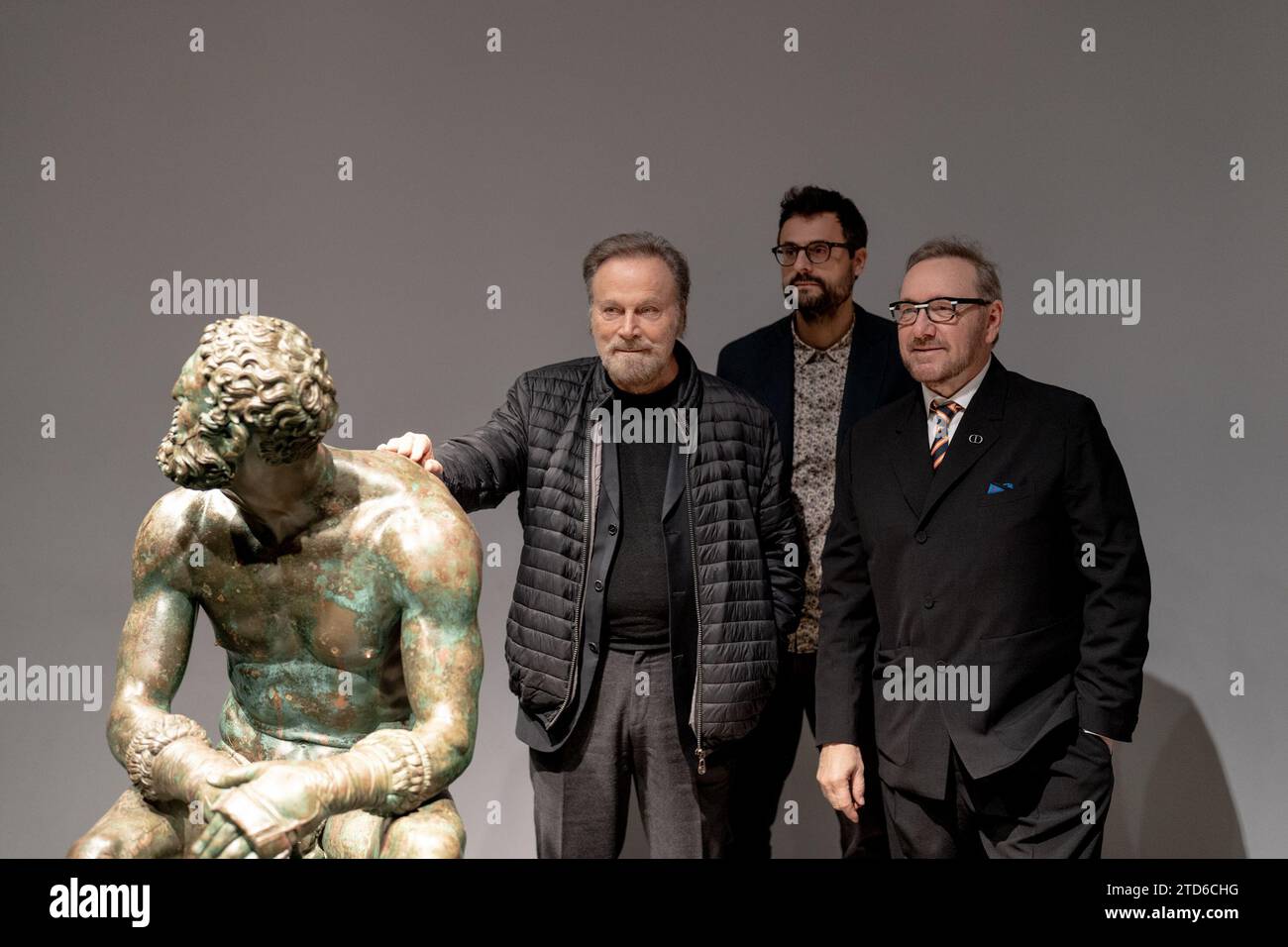 Franco Nero, Gabriele Tinti, and Kevin Spacey are attending a screening in Rome, Italy, on December 17, 2023, where Kevin Spacey and Franco Nero are reading poems by Gabriele Tinti, inspired by 'The Boxer at Rest,' at Palazzo Massimo alle Terme. (Photo by Luca Carlino/NurPhoto) Stock Photo