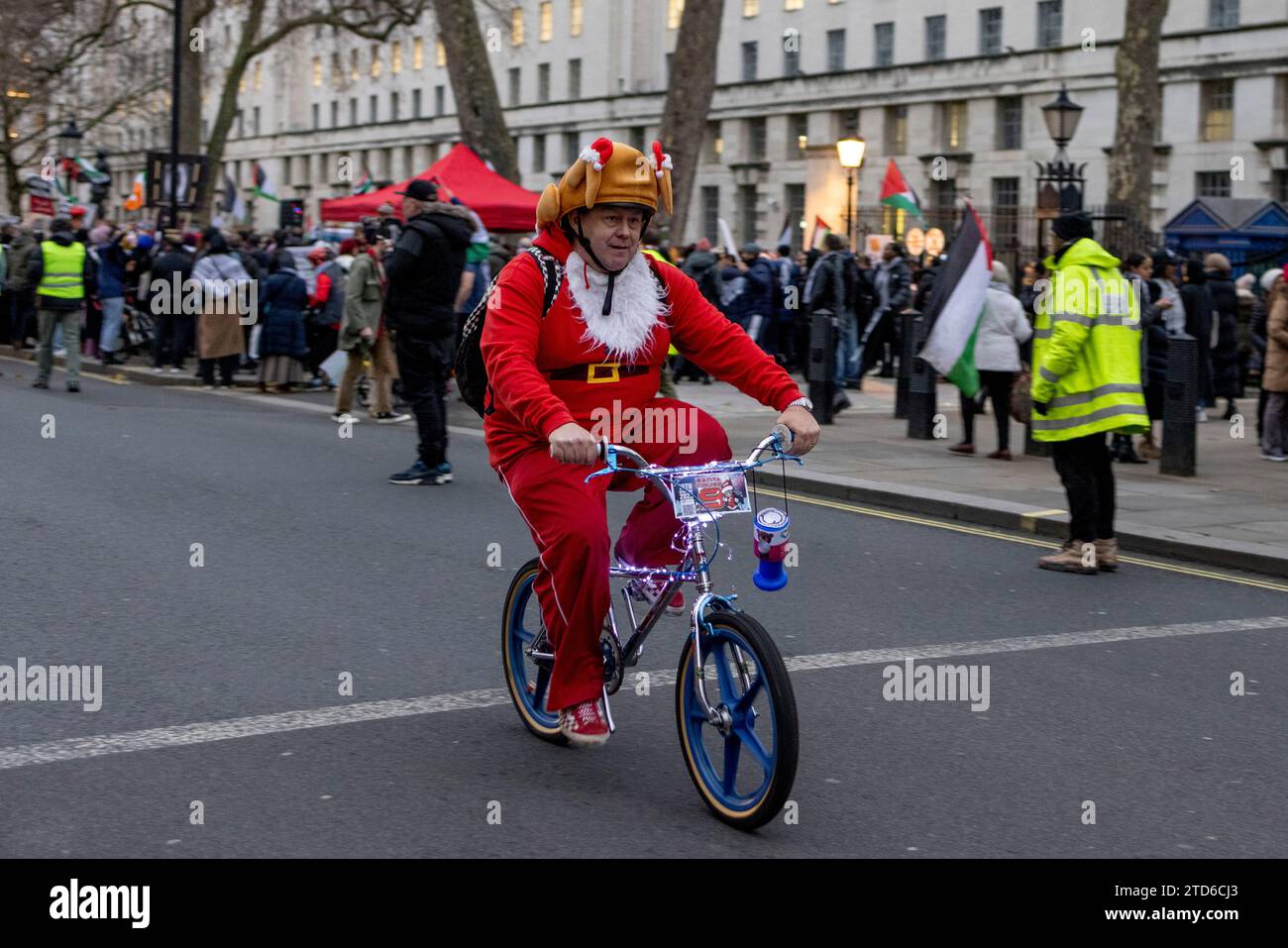 A participant seen riding his bike with a turkey hat during the annual ...