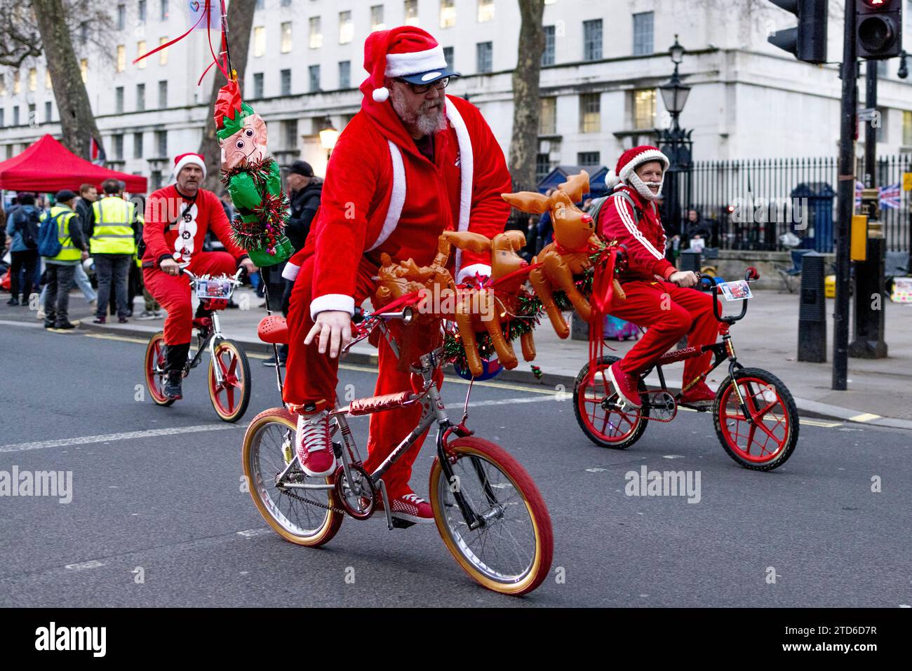Santa Rider A man seen riding his bike full of Christmas elements during the annual ...