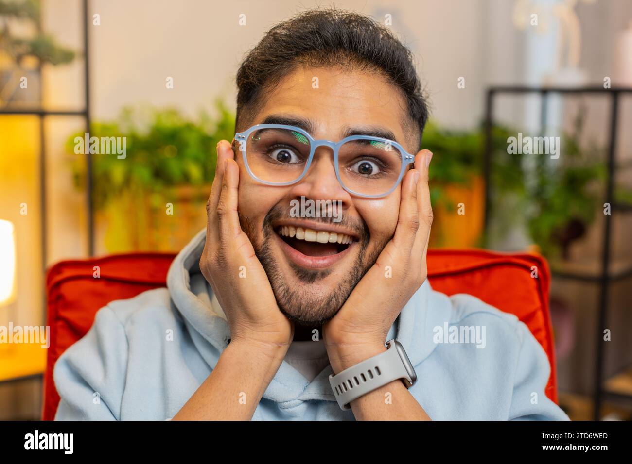 Surprised overjoyed indian guy hi-res stock photography and images - Alamy