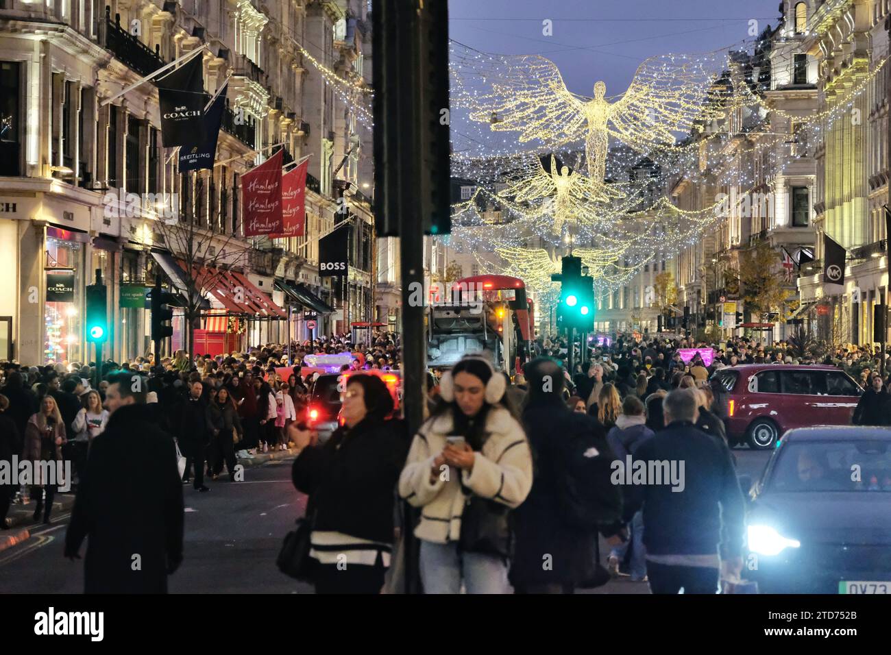 London, UK. 16th December, 2023. Regent Street is filled with shoppers and sightseers on the penultimate Saturday before Christmas Day with retailers making a final push to bolster sales as the British Retail Consortium (BRC) reported last month that shops faced a 'challenging Christmas' with consumers spending less. Credit: Eleventh Hour Photography/Alamy Live News Stock Photo