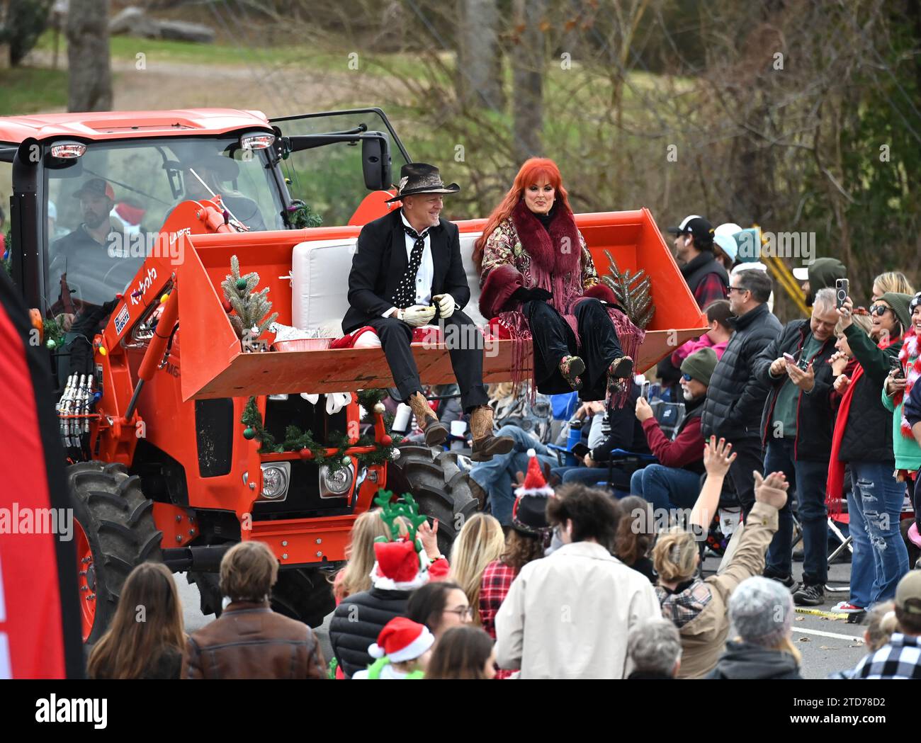 Leipers Fork, Tennessee, USA. 16th Dec, 2023. Grand marshals, Wynonna Judd and husband Cactus Moser arrived on a Kubota tractor at the Leipers Fork's Christmas Parade on December 16, 2023 in Leipers Fork, TN. Credit: Tammie Arroyo/AFF-USA.com Credit: AFF/Alamy Live News Stock Photo