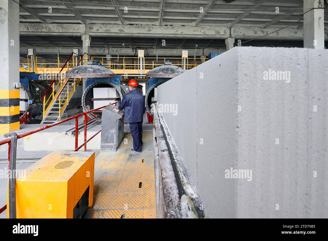 Loading of raw blocks into autoclave at manufacturing plant Stock Photo ...