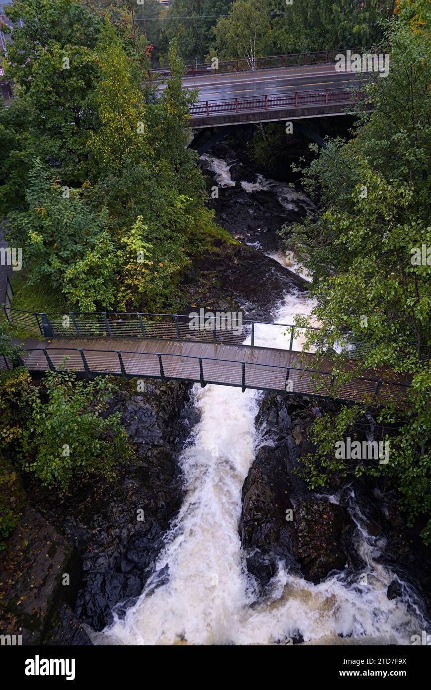 Bridges over a canyon with a rushing creek. Stock Photo