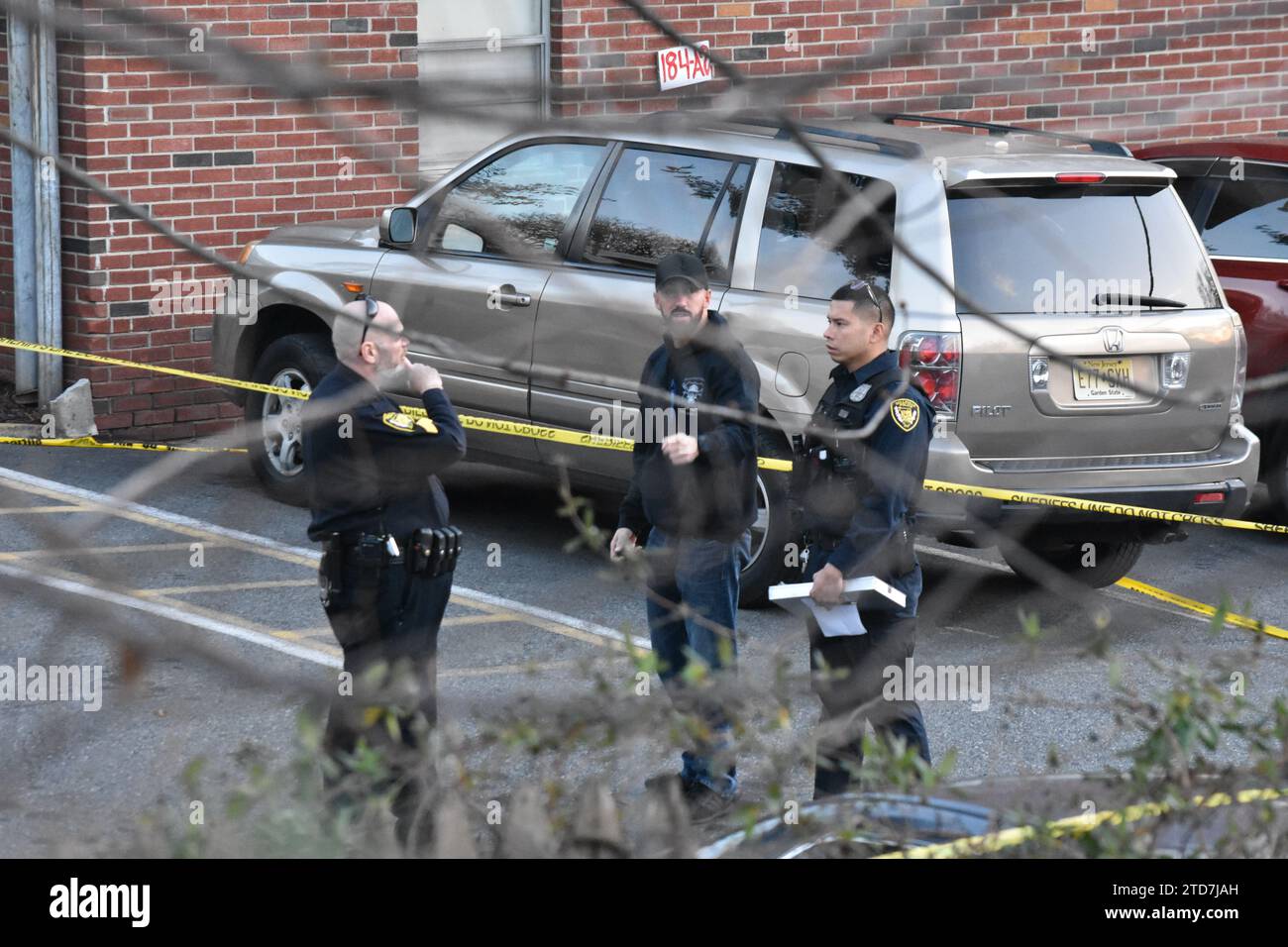 Belleville, New Jersey, USA. 16th Dec, 2023. Police officers search for clues at the crime scene