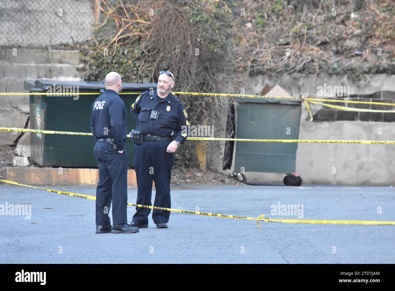 Belleville, New Jersey, USA. 16th Dec, 2023. Police officers search for clues at the crime scene
