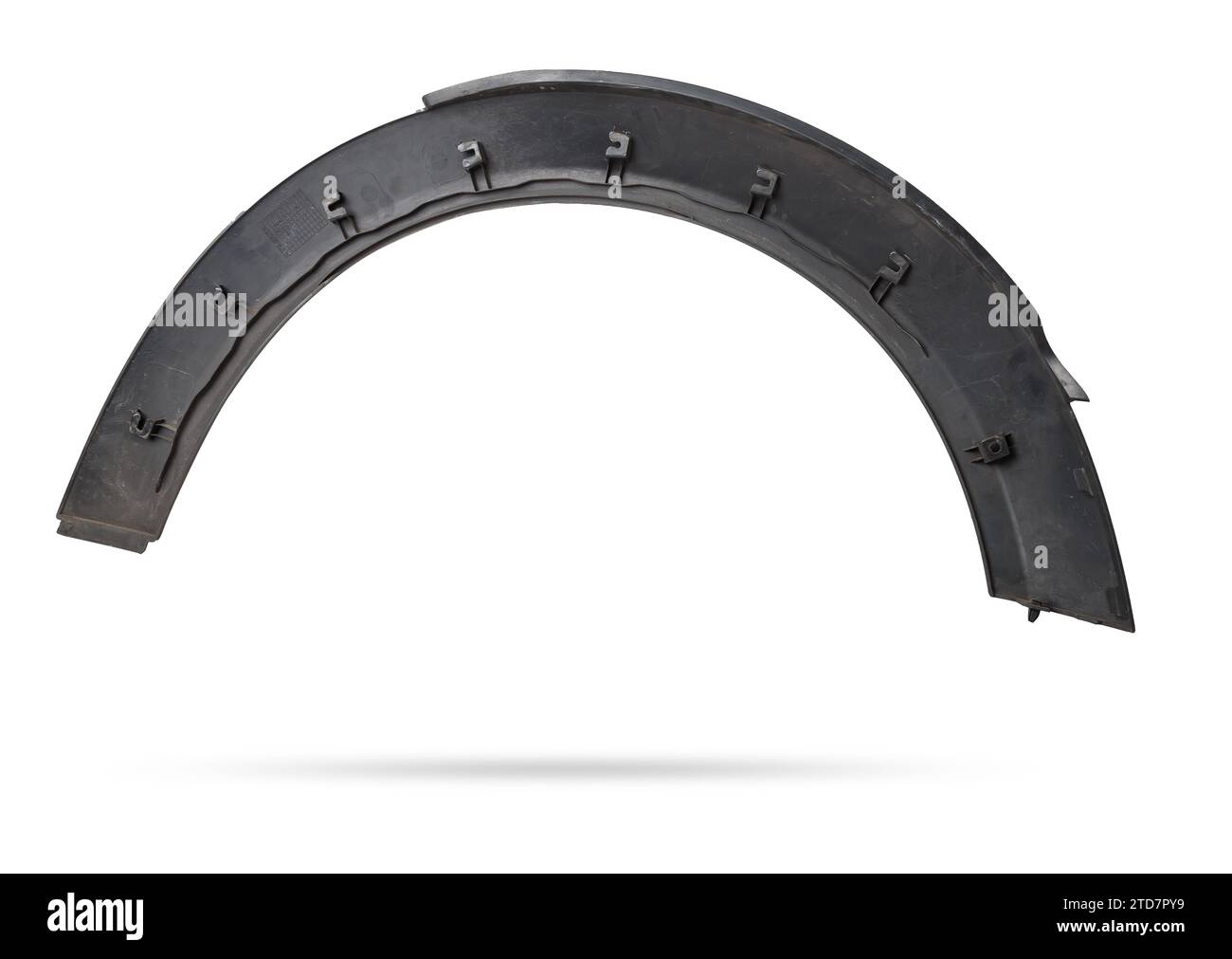 Black plastic fender flare on a white isolated background in a photo studio for sale or replacement in a car service. Mudguard on auto-parsing for rep Stock Photo