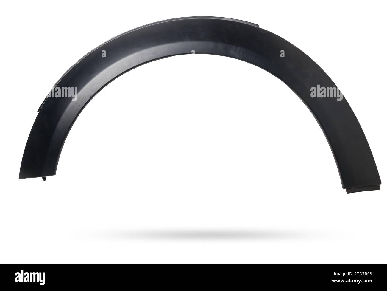 Black plastic fender flare on a white isolated background in a photo studio for sale or replacement in a car service. Mudguard on auto-parsing for rep Stock Photo