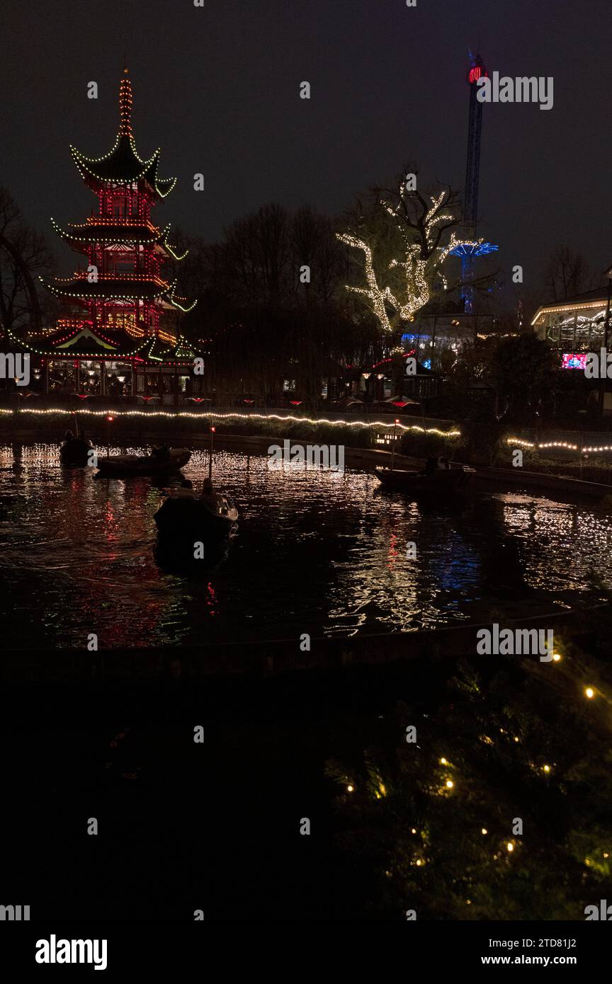 Some of the attractions such as the Oriental temple in Tivoli Gardens and Christmas lights as part of the Julemarked (Christmas market) in Copenhagen Stock Photo