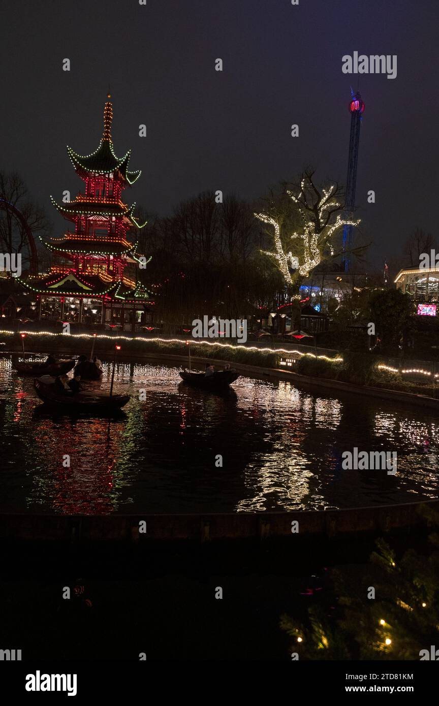 Some of the attractions such as the Oriental temple in Tivoli Gardens and Christmas lights as part of the Julemarked (Christmas market) in Copenhagen Stock Photo