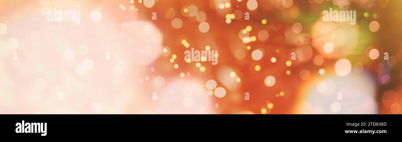 Abstract light celebration background with defocused golden lights for ...
