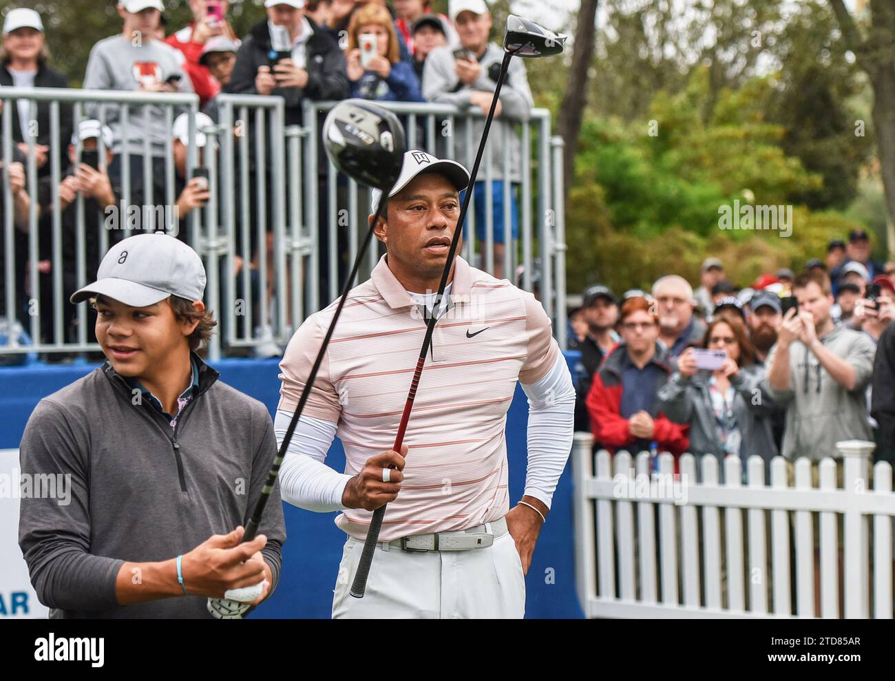 Orlando, United States. 16th Dec, 2023. Tiger Woods and his son, Charlie Woods, wait to tee off on the first hole during the first round of the PNC Championship at the Ritz-Carlton Golf Club in Orlando. Credit: SOPA Images Limited/Alamy Live News Stock Photo