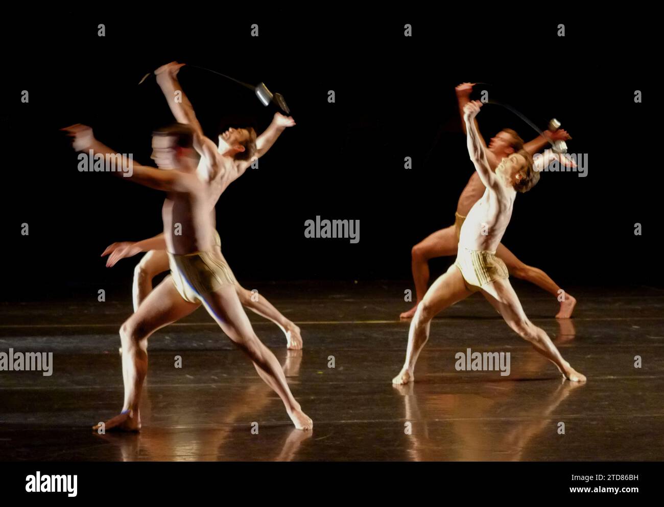 Four male dancers with rapiers in blurred motion - The Australian Ballet  PETITE MORT Dance production/Choreography Jiří Kylián - Sydney Opera House Stock Photo