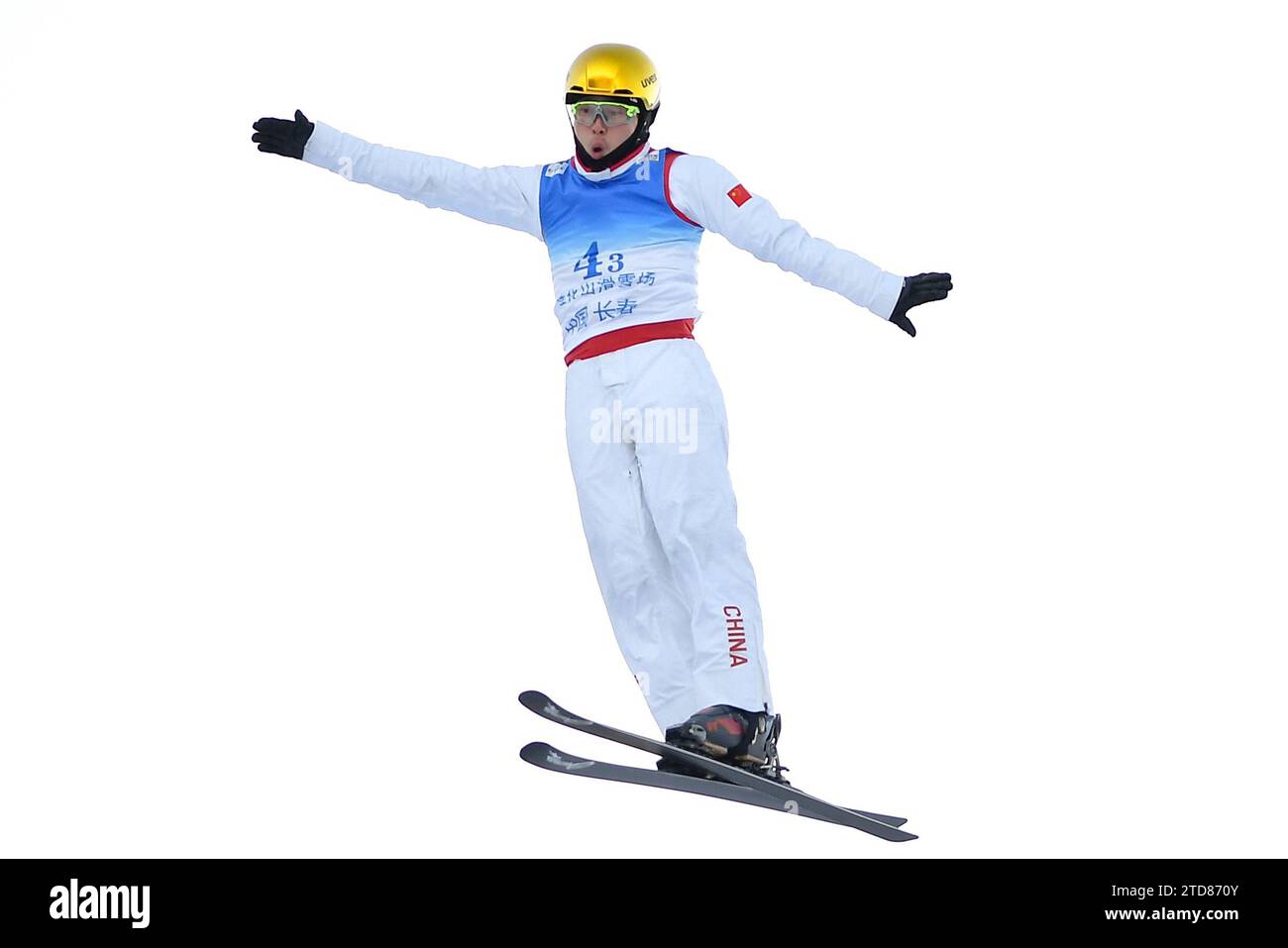 Changchun. 17th Dec, 2023. Qi Guangpu of the Team People's Republic of China 1, competes during the final of Mixed Team Aerials at 2023-2024 FIS Freestyle Ski Aerials World Cup in Changchun, capital of northeast China's Jilin Province, Dec. 17, 2023 Credit: Xu Chang/Xinhua/Alamy Live News Stock Photo