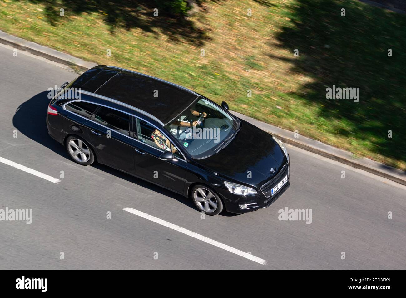 OSTRAVA, CZECH REPUBLIC - AUGUST 24, 2023: Peugeot 508 SW (first W23 generation) with motion blur effect Stock Photo