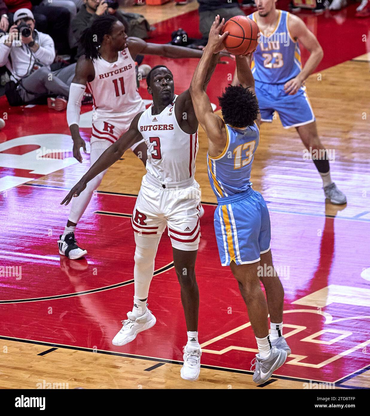 Rutgers Scarlet Knights forward Mawot Mag (3) defends against Long Island Sharks guard Tai Strickland (13) in the first half at Jersey Mikes Arena in Piscataway, New Jersey on Saturday, December 16, 2023. Duncan Williams/CSM. Stock Photo