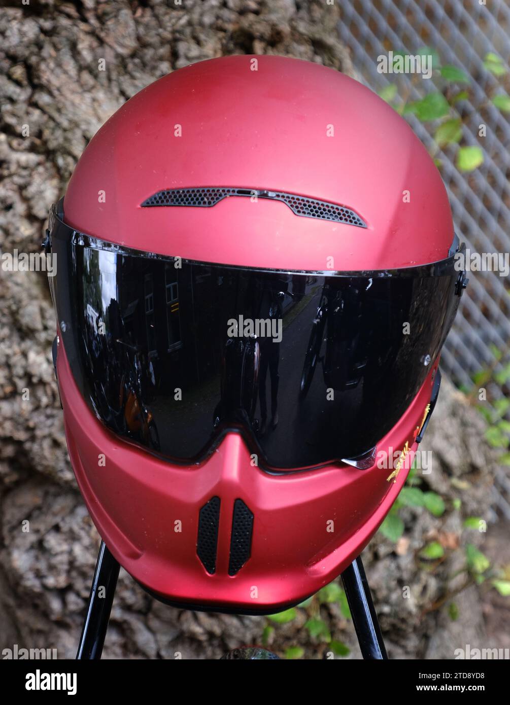 Modern bikers safety helmets at outdoor bike club show. Stock Photo