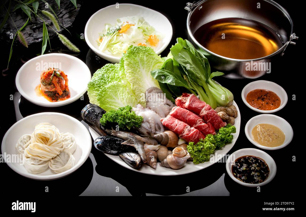 Ingredients for shabu-shabu cooking on a black background Stock Photo