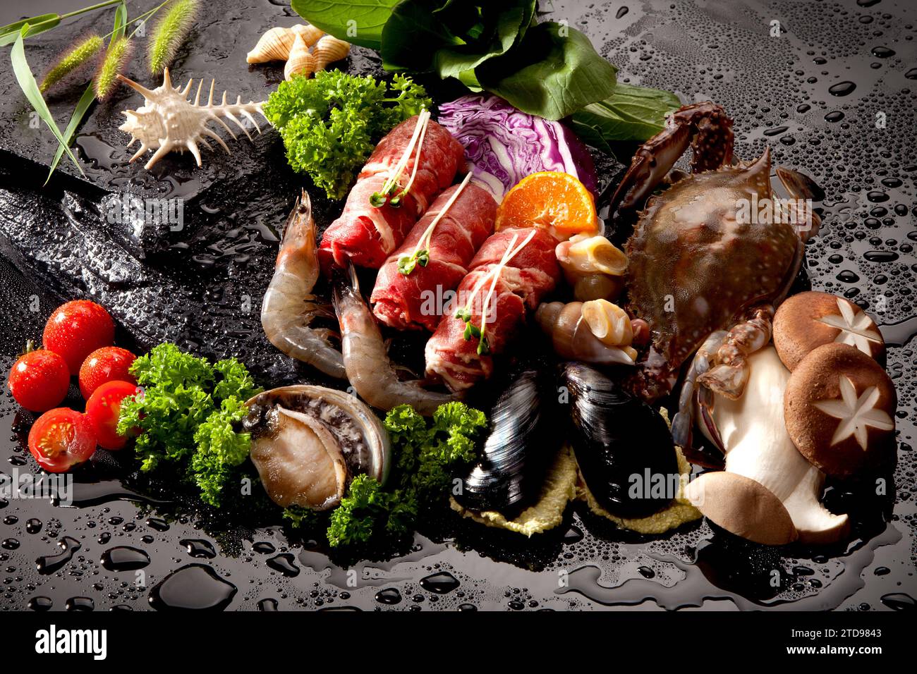 Ingredients for shabu-shabu cooking on a black background Stock Photo