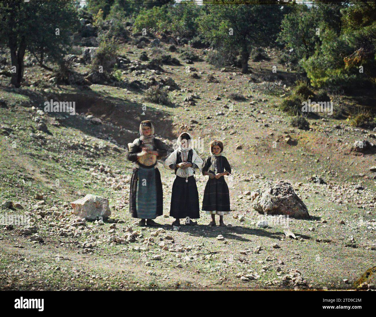 Domaine de Tatoï, Greece Three little peasant girls (shepherdess), Clothing, Human beings, Society, Costume, Shepherd, Child, Group portrait, Child labor, Greece, Thatoï, Three shepherdesses from Attica (Greeks), Tatoï, 10/10/1913 - 10/10/1913, Léon, Auguste, photographer, 1913 - Balkans, Italy - Léon Busy and Auguste Léon - (September - 23 October), Autochrome, photo, Glass, Autochrome, photo, Positive, Horizontal Stock Photo