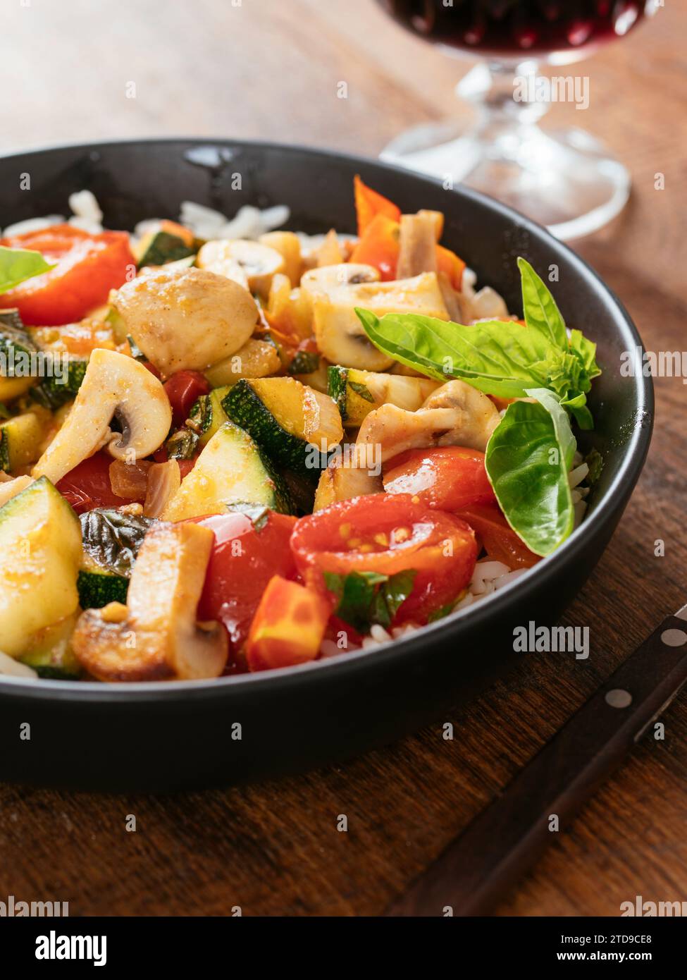 Italian Style Zucchini and Mushrooms on rice Stock Photo