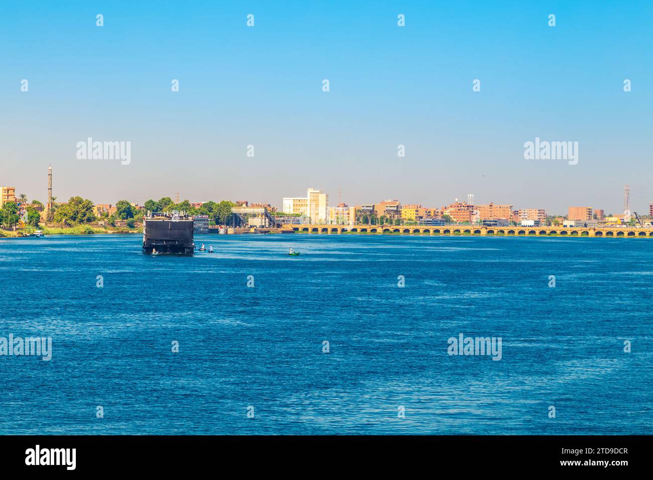 Cruise ships pass through the Esna lock. Water gate on the Nile River connecting Luxor and Aswan. Esna, Egypt - October 20, 2023. Stock Photo