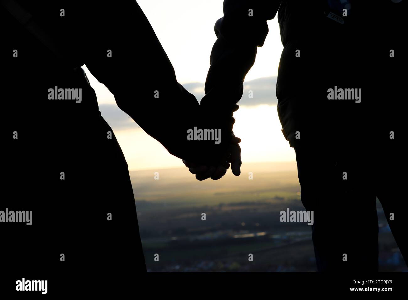 Hands touching silhouette hi-res stock photography and images - Alamy