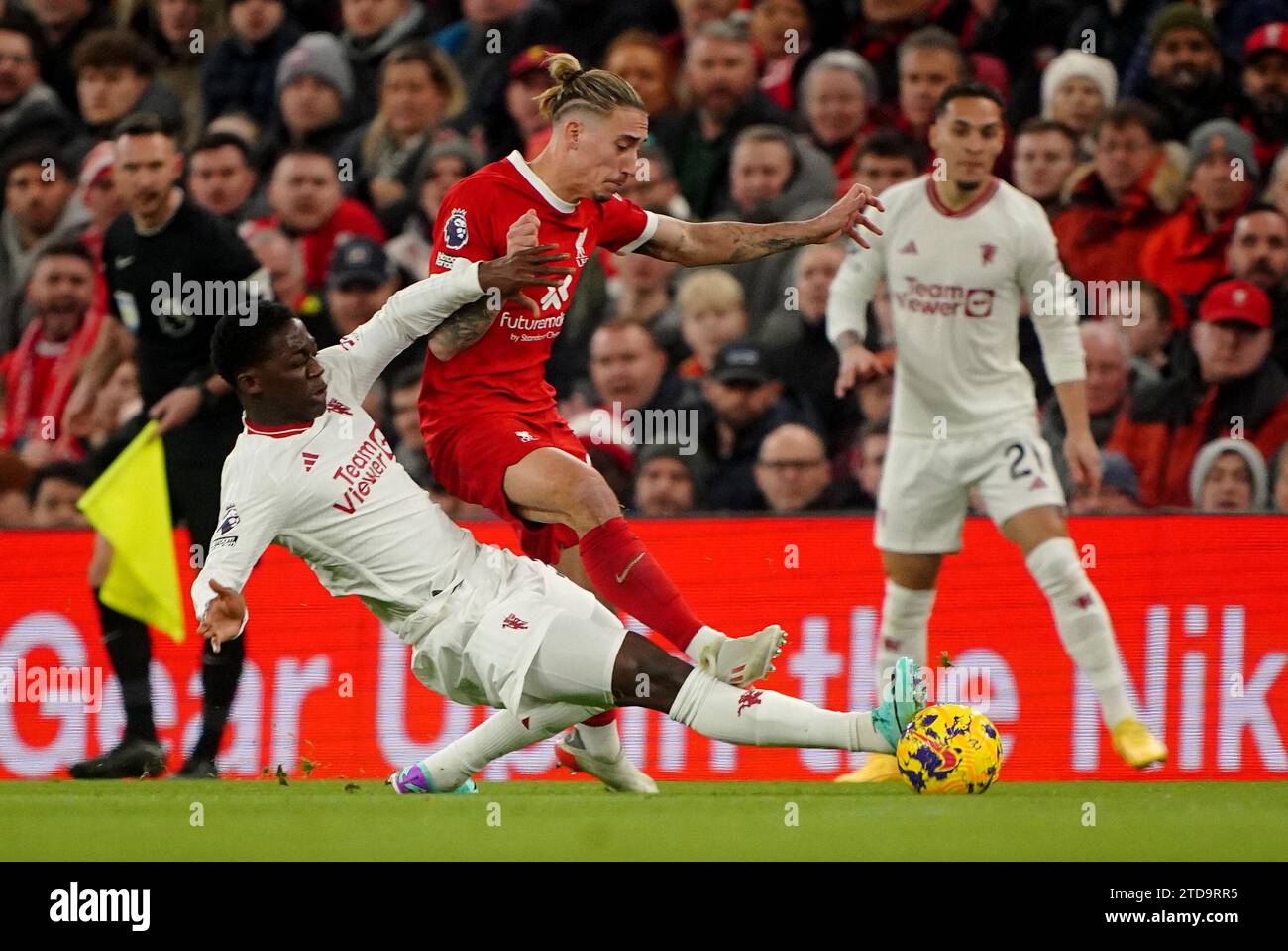 Liverpool's Kostas Tsimikas (centre) And Manchester United's Kobbie ...