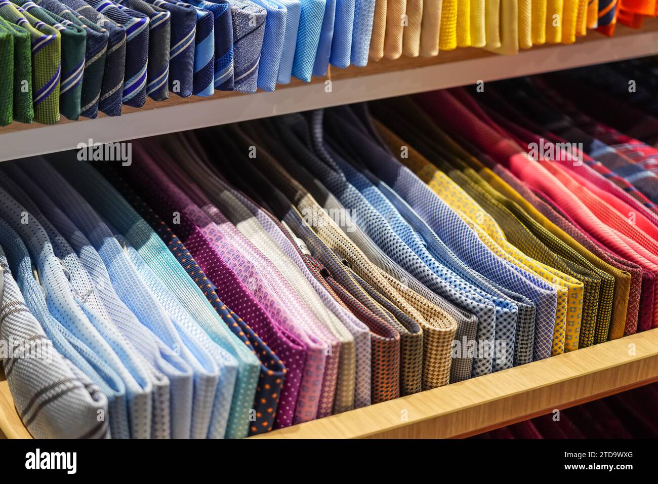 Ties of red shade and colorful tones with strict design pattern are ...