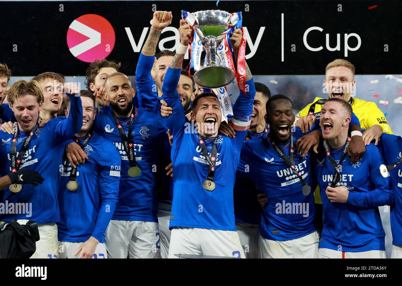 Rangers' James Tavernier lifts the trophy as Rangers' players celebrate ...