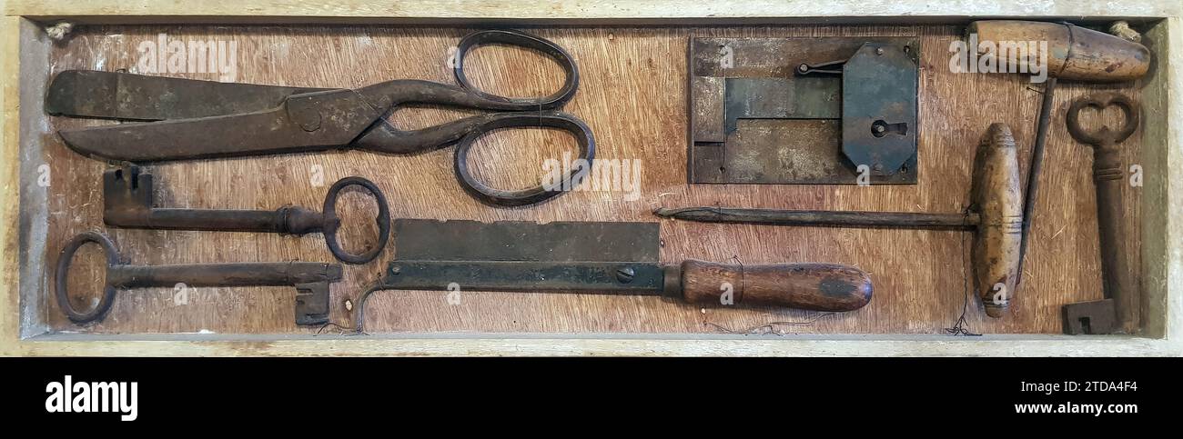 Drawer with obsolete tools inside Stock Photo