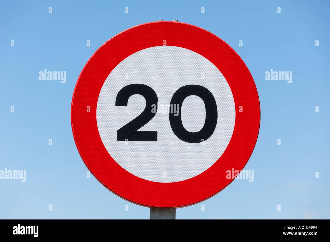20km h Street Sign with Blue Sky Urban Traffic Regulation and Road