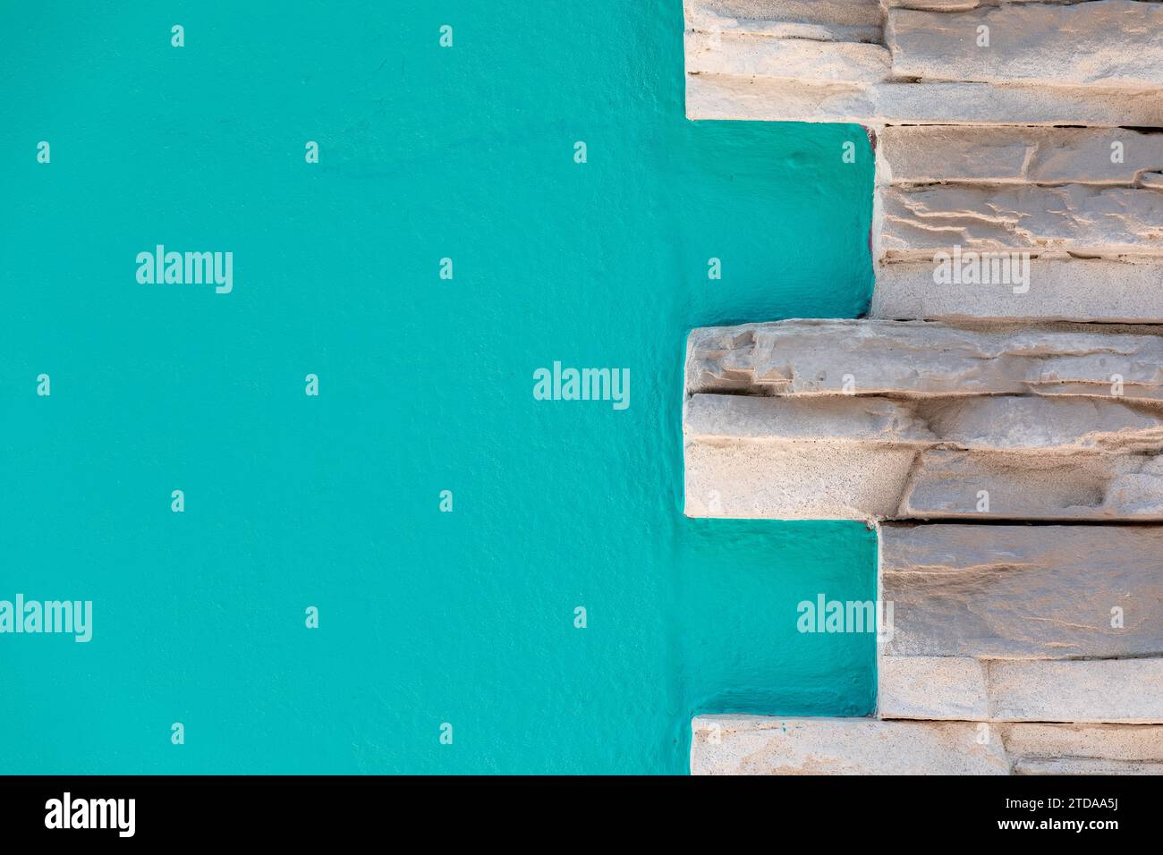 Turquoise Painted Wall Background Texture: Vibrant and Modern Surface for Slideshows and Presentations Stock Photo
