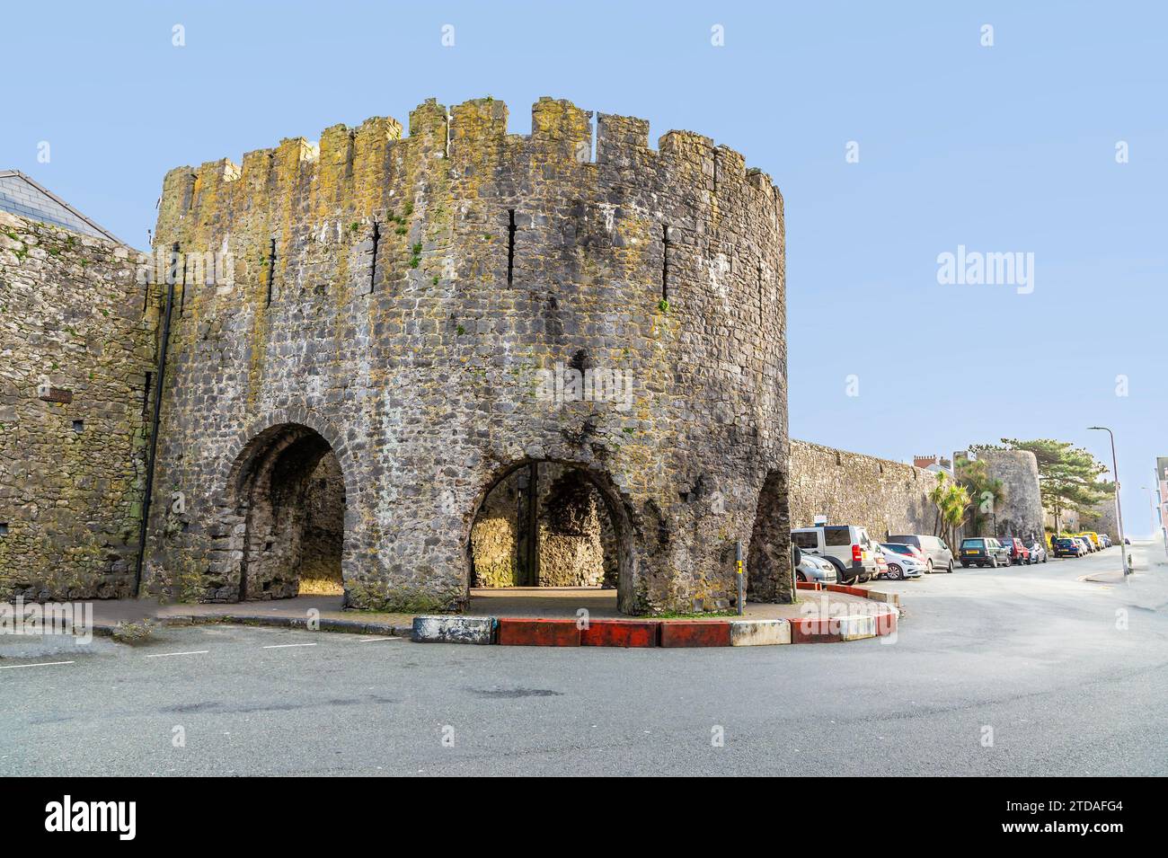A view of the five arches entrance through the town walls in Tenby, Wales on a sunny day Stock Photo
