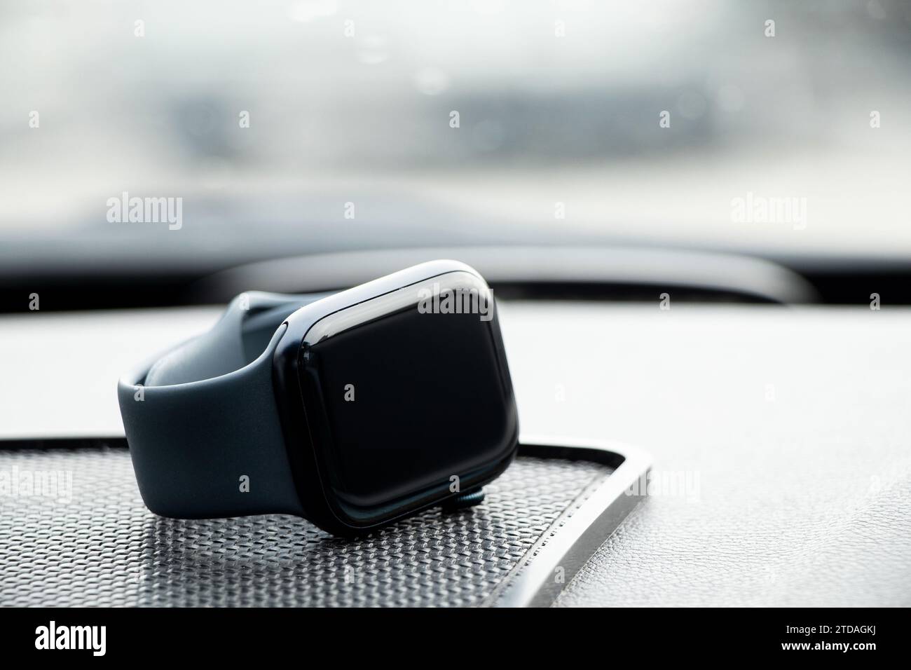 Dnipro, Ukraine - December 17, 2023: Apple Watch Series 8 lies in a car in the cabin, smart watch Stock Photo