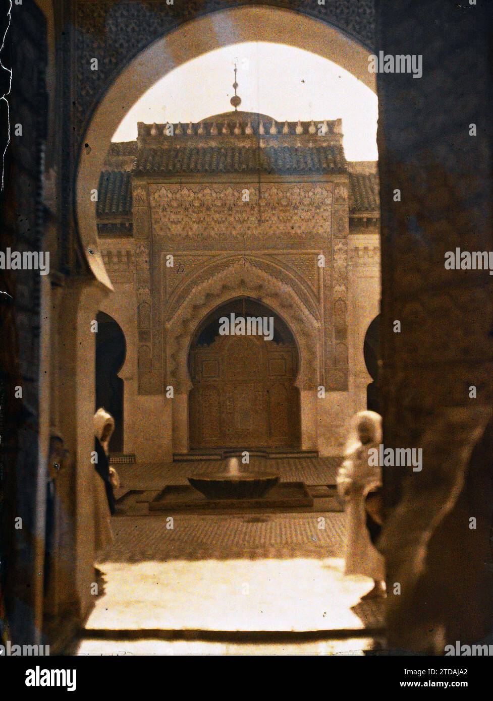 Fez, Morocco View of the central nave from the Rose Gate of the el Qarayouine mosque-university, Religion, HD, Art, Habitat, Architecture, Islam, exists in high definition, Sculpture, Painting, Patio, Hydraulic installation, Fountain, Stucco, Basin, Religious architecture, Morocco, Fez, Courtyard of the Moulay Idriss mosque, Fès, 01/01/1913 - 31/01/1913, Passet, Stéphane, photographer, 1912-1913 - Maroc - Stéphane Passet - (December-January), Autochrome, photo, Glass, Autochrome, photo, Positive, Vertical, Size 9 x 12 cm Stock Photo