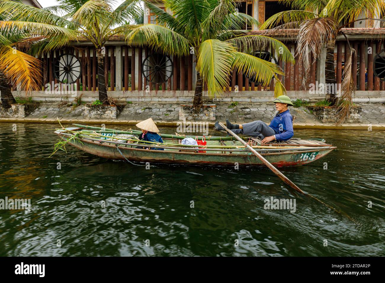 Tourist on a boat tour at Tam Coc in vietnam Stock Photo - Alamy