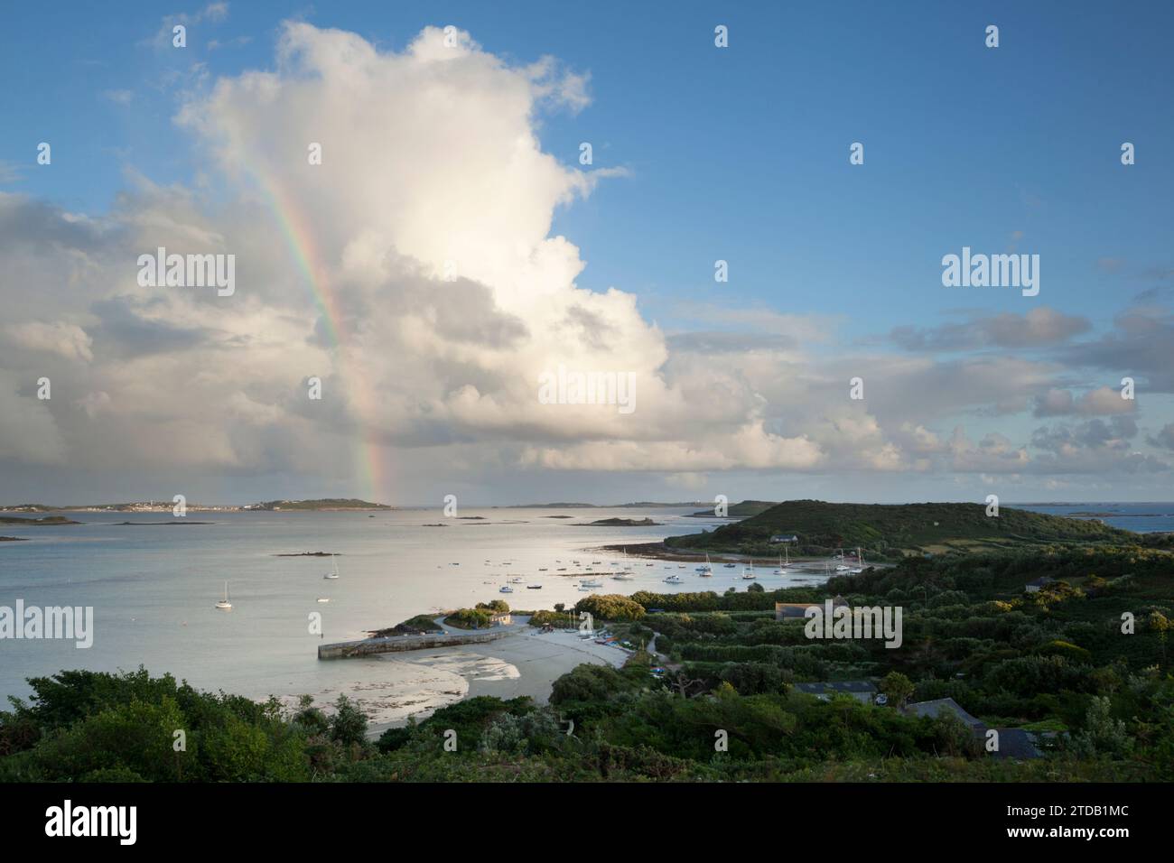 Rainbow seen from Bryher. Isles of Scilly, Cornwall, UK. Stock Photo