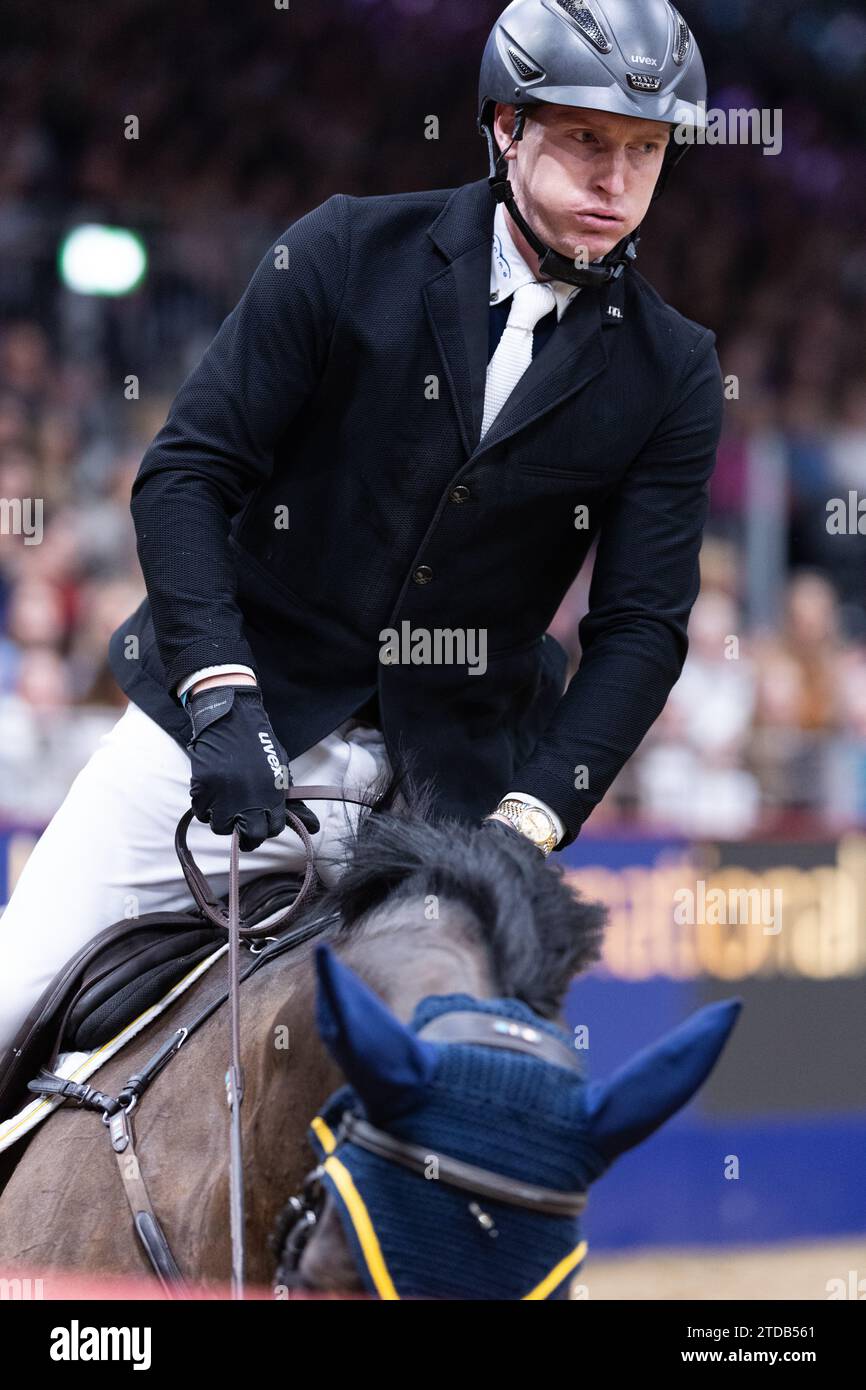 London, UK. December 17, 2023. Daniel Coyle of Ireland with Legacy competing during the Longines FEI Jumping World Cup at the London International Horse Show on December 17, 2023, London Excel Centre, United Kingdom (Photo by Maxime David - MXIMD Pictures) Credit: MXIMD Pictures/Alamy Live News Stock Photo